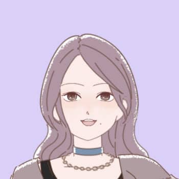 襟元のてんとうむし